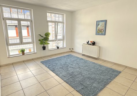 Huy-Centre: sympathique appartement à vivre ou pour y faire fructifier vos économies en le louant.